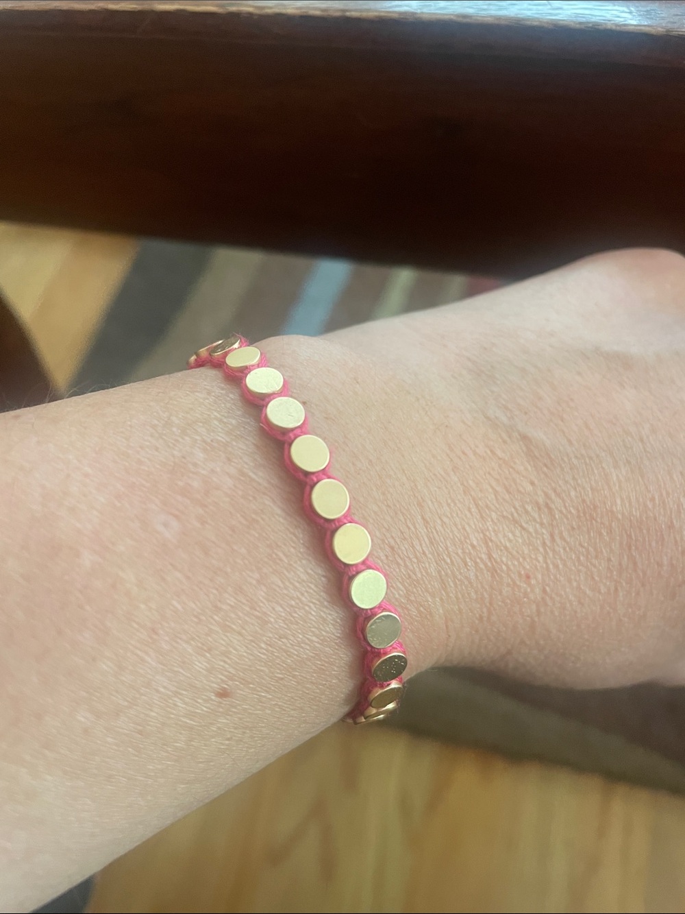 Plunder Hot Pink Cord Slider Bracelet with Gold Disc Accents. New in gift bag.